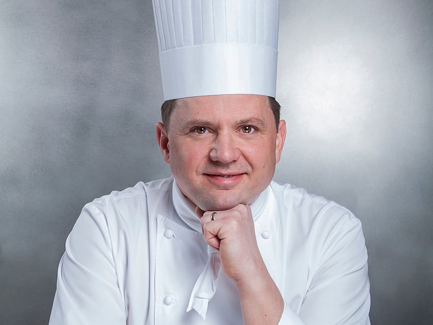 Franck Giovannini mit Kochhaube