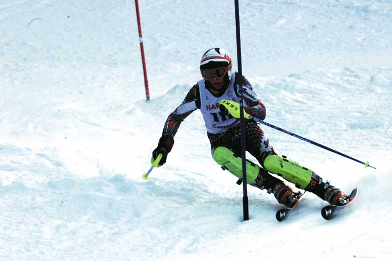 Sportkarriere ein Skifahrer beim Slalom Rennen