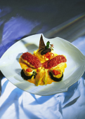 Champagnerkutteln mit Pulpo und Blattsalatsauce"