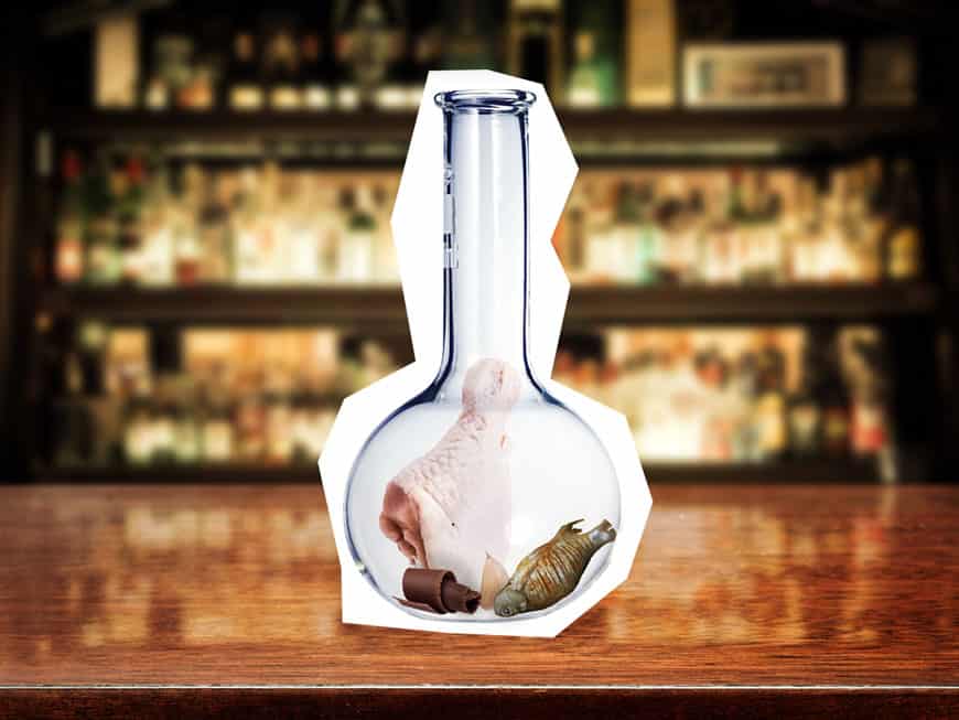 Reagenzglas mit Fisch und Huhn