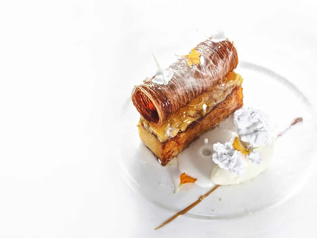 Gericht von Karlheinz Hauser: Salziger Kokossud | Karamell | Banane | Passionsfrucht Gericht von Karlheinz Hauser: Salziger Kokossud | Karamell | Banane | Passionsfrucht