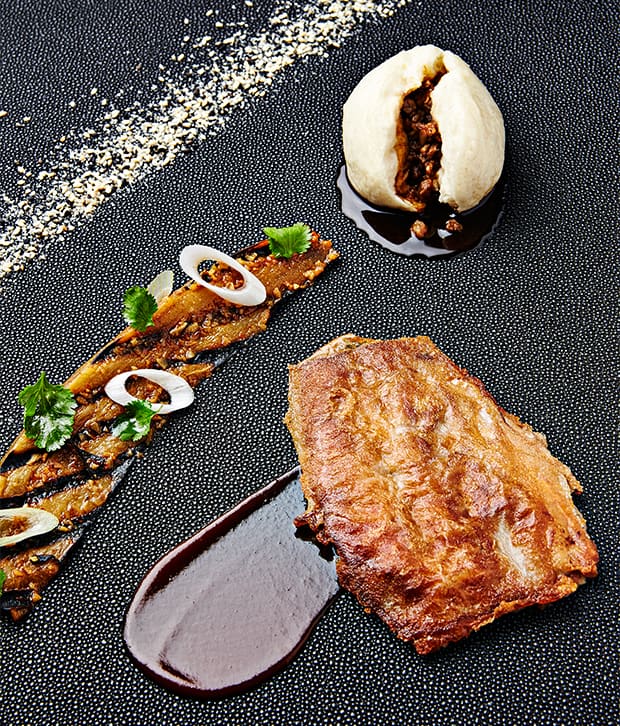 Schweineschwänzchen Schweineschwänzchen an BBQ-Sauce mit spicy Melanzani
