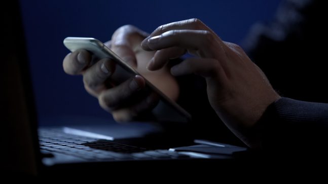 shutterstock_1038184249_scammer-hacker-e1657701433252